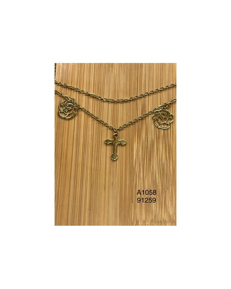 Tobillera con cruz y rosa doradas – Elegancia y espiritualidad en un d