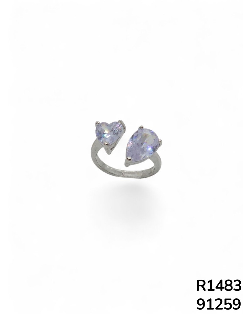 R1483 Anillo ajustable con cristal en forma de lágrima en un extremo y en forma de corazón en el otro extremo.